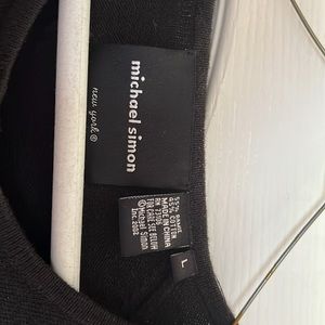 Black sweater, fabric buttons, design “shoe shopping girl”